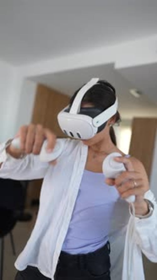 Woman Using VR Headset Indoors