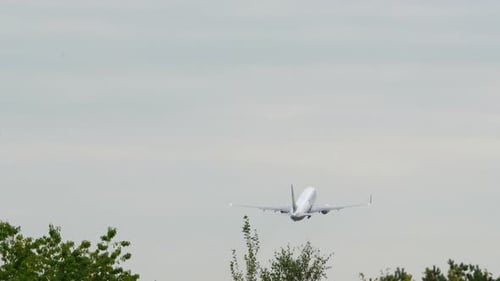 Airplane Flying Away After Takeoff