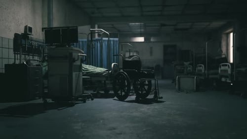 Abandoned Hospital Room with an Empty Wheelchair in Dim Light