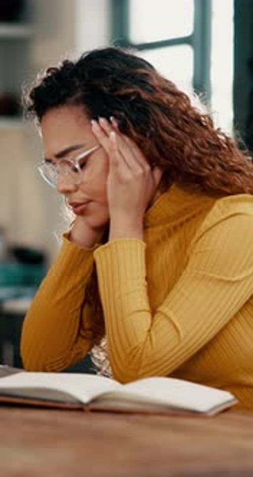 Home, woman and student with headache, stress and exam pressure with university loan