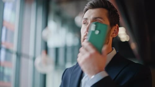 Business Manager Speaking Cellphone at Office Hall Closeup Bearded Businessman