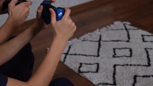 Player on Hardwood Flooring Controlling Game with Gestures