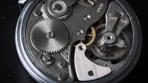 The Mechanism of Vintage Stopwatch Rotates CloseUp