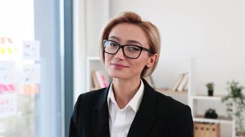 Portrait of Confident Businesswoman Standing in Office