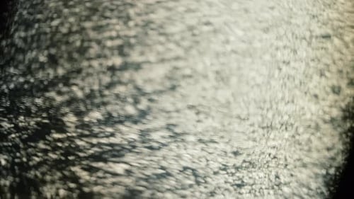 Sunlight Reflections on Water Surface, Abstract Background