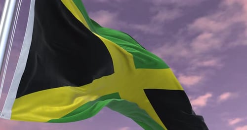 Realistic Waving Flag of Jamaica against a Cloudy Sky
