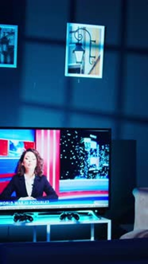 Vertical Video Streaming Equipment in Modern Apartment Illuminated with RGB Lights at Night