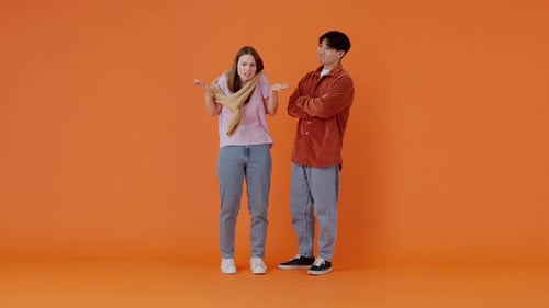 Angry European Woman Yells at Positive Asian Man in Premise