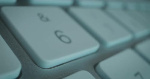 Flight over huge keys of computer keyboard. pan timeramp shot