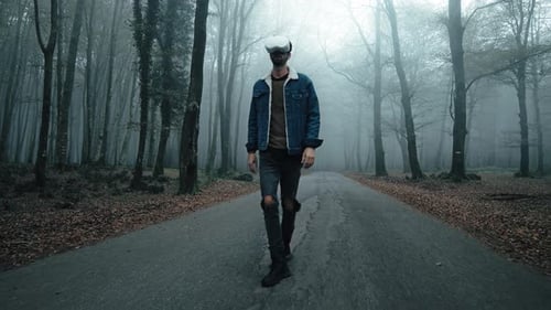 Adult Exploring Woods with Virtual Reality Headset