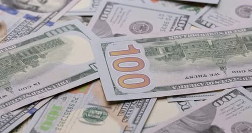 Cash USD Money Background One Hundred Dollar Banknotes Rotate in Close Up Macro View