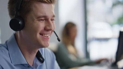 Helpdesk Operators Team Talking in Headset Consulting Clients in Office Closeup