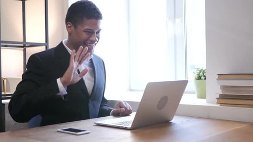 Young Man Working on Laptop During Day