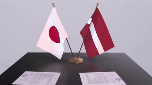 Japan and Latvia Flags on Desk with Documents Signing Animation