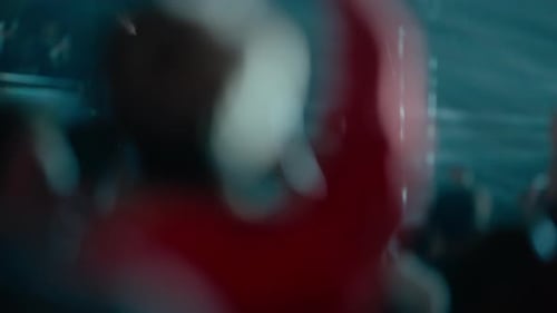 Enthusiastic Crowd Enjoying an Exciting Nighttime Event