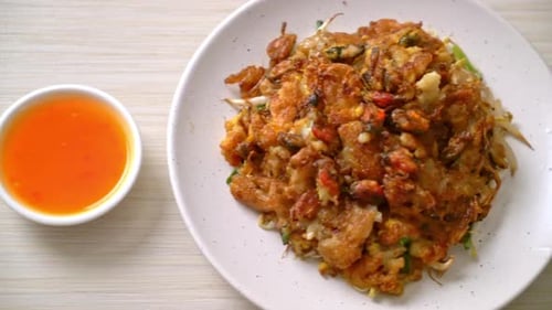 Oyster Omelet Dish with Dipping Sauce Overhead Shot