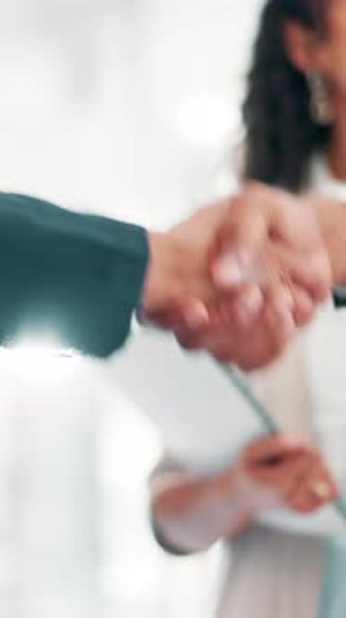 Agreement, deal and shaking hands with business people in office for collaboration or partnership