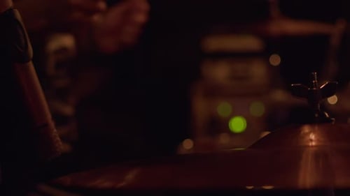 Drum Player Performing a Cheerful Rock Song Hitting the Drums of the Drum Set During the Show on a