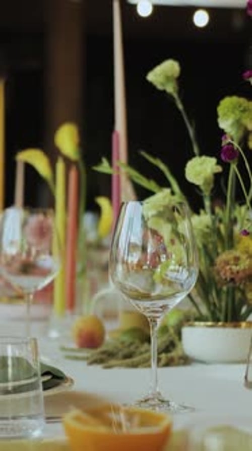 Elegant Table Setting with Flowers and Candles
