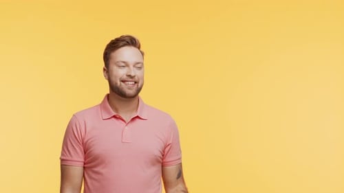 Expressive Young Man Over Vibrant Background Studio Portrait of Handsome Person