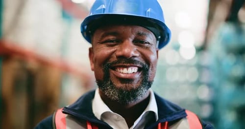 Logistics, face or black man in warehouse with laugh, pride or experience in shipping industry