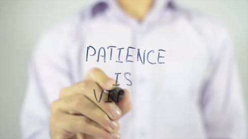 Hand Writing Patience is Virtue With Marker