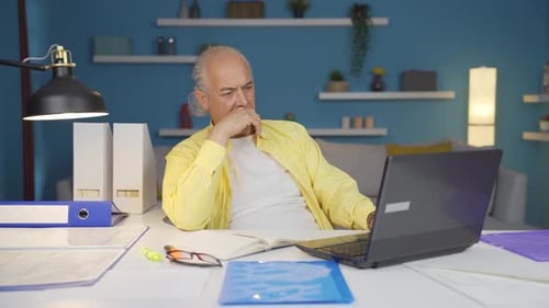 Home office worker old man thoughtful.