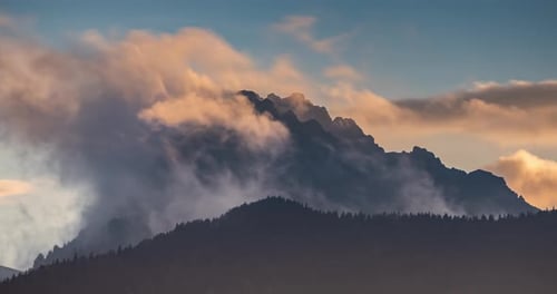 Misty Clouds Over Alps Mountains Peak Time Lapse