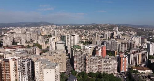 Drone Shot Above Old Tbilisi Apartment Buildings Showing the City Skyline