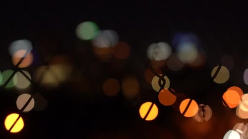 blurry city view with bokeh light effect at night