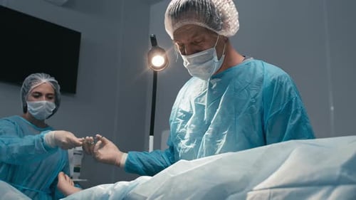 Surgeons Performing Procedure in Hospital Setting