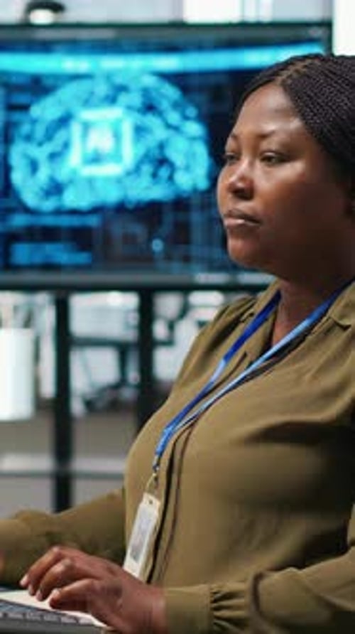 Vertical Video Female Technician Writing Code on PC Developing Neural Networks APIs