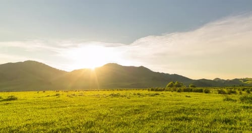 Mountain Meadow Timelapse at the Summer or Autumn Sunset Time Wild Nature and Rural Field Clouds