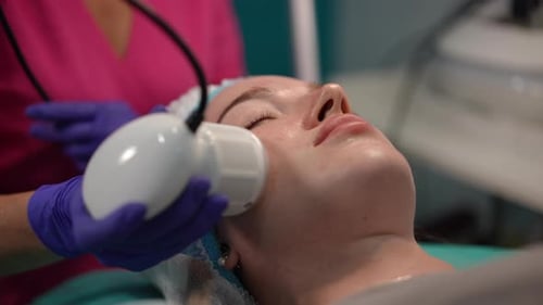 Facial Contouring Procedure with Modern Device in Professional Skincare Clinic