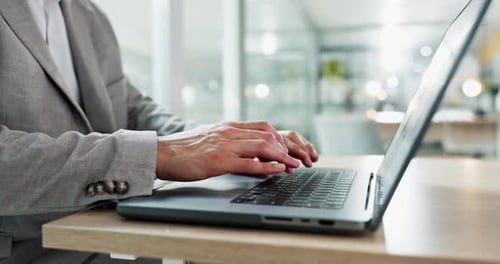 Hands typing, laptop and closeup at desk, email communication and planning, contact or networking
