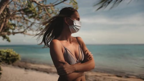Young Woman Wearing Protective Mask Enjoying Tropical Beach