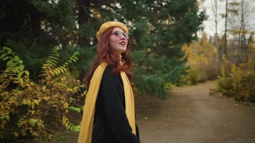 Elegant Girl with Yellow Beret Smiling in Park