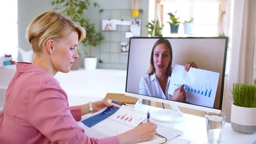 Businesswoman works from home office during lockdown having a video call meeting