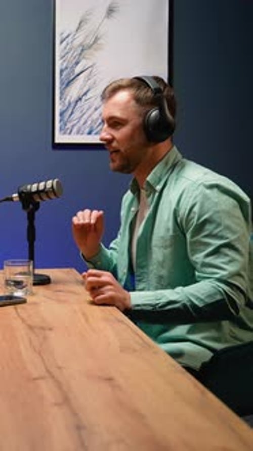 Excited Podcast Host Engaging in a Dynamic Discussion