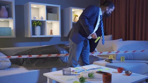 Detective at Crime Scene Placing Evidence Markers