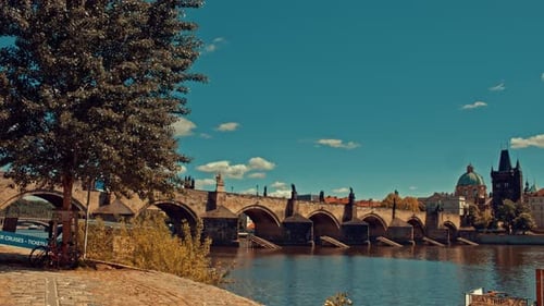 Time lapse of Charles Bridge during COVID-19 quarantine completely empty from tourists in a sunny da