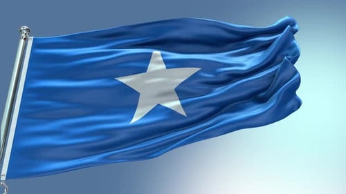 Realistic Waving Somalia National Flag on Flagpole against Blue Sky