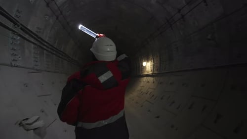 Underground Corridor Becomes Alive with Light of Lamp