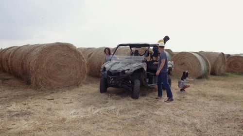Farmer Family Jumping Down From Quadbe on Rural Farm 1213 Years