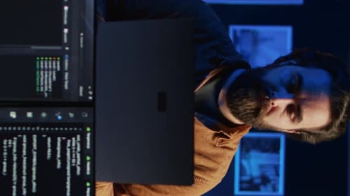Portrait of Smiling Developer Writing Complex Binary Code Scripts on Laptop