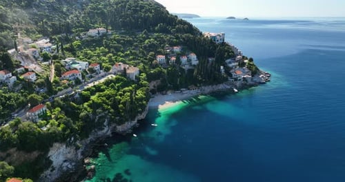 Drone views over the resorts, houses and coastline in Durbovnik.