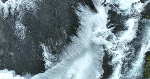 Aerial Shot of Wild River with Huge Waterfall