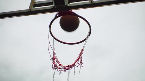 Indoor Court Action Scene Aerial View of Basketball Shot Midair During Play Cinematic Footage