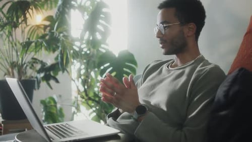 Young Adult on Video Call at Home