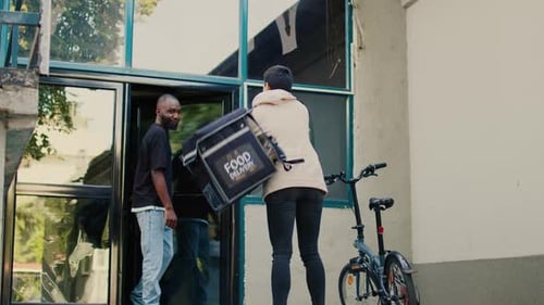Confused Delivery Worker Giving Wrong Fastfood Order to Customer